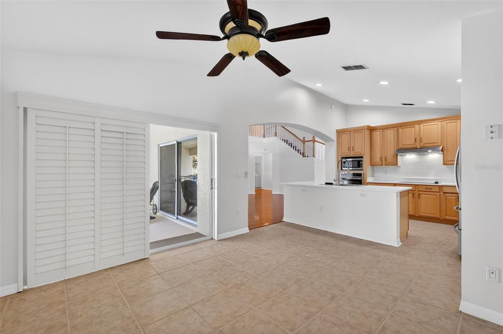 729 Strihal Loop Oakland, FL 34787 - Photo 24 of 49 a view of kitchen with furniture and refrigerator