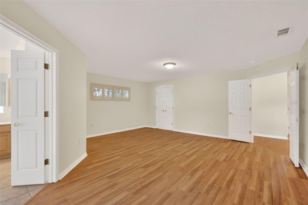 729 Strihal Loop Oakland, FL 34787 - Photo 26 of 49 a view of an empty room and wooden floor