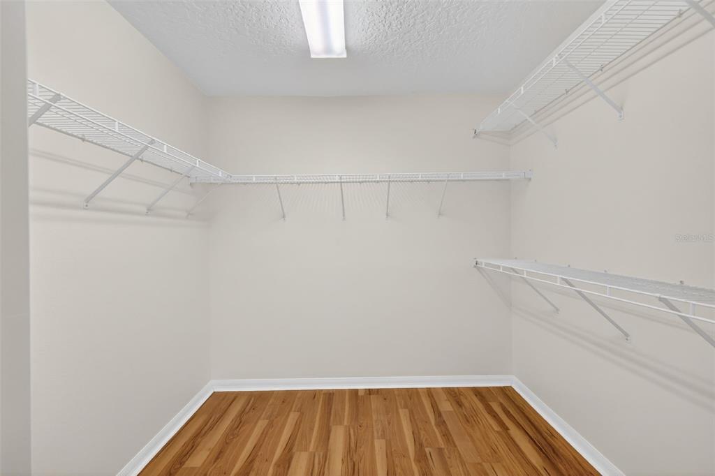 729 Strihal Loop Oakland, FL 34787 - Photo 28 of 49 a view of a room with racks on the wall