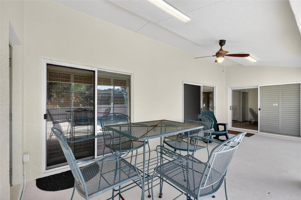 729 Strihal Loop Oakland, FL 34787 - Photo 43 of 49 a view of a dining room with furniture and a chandelier fan