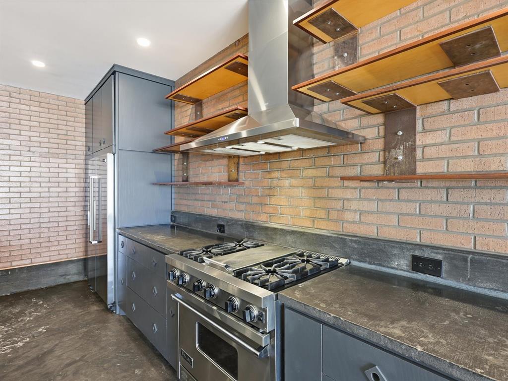 511 North Akard Street, Unit 1505 Dallas, TX 75201 - Photo 20 of 39 Viking SS gas range and refrigerator will wow you