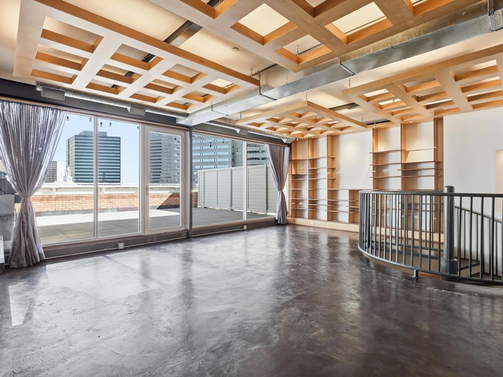 511 North Akard Street, Unit 1505 Dallas, TX 75201 - Photo 6 of 39 The wall of windows bathes the PH in a swath of light