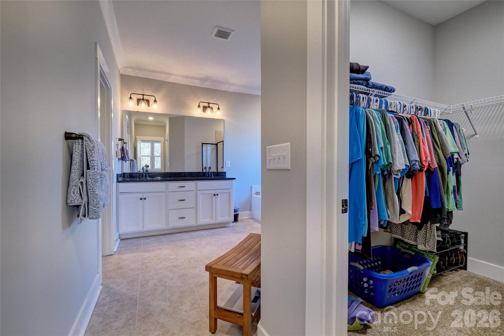 398 Kingsburry Road Clover, SC 29710 - Photo 18 of 48 a view of walk in closet with clothes and shoes