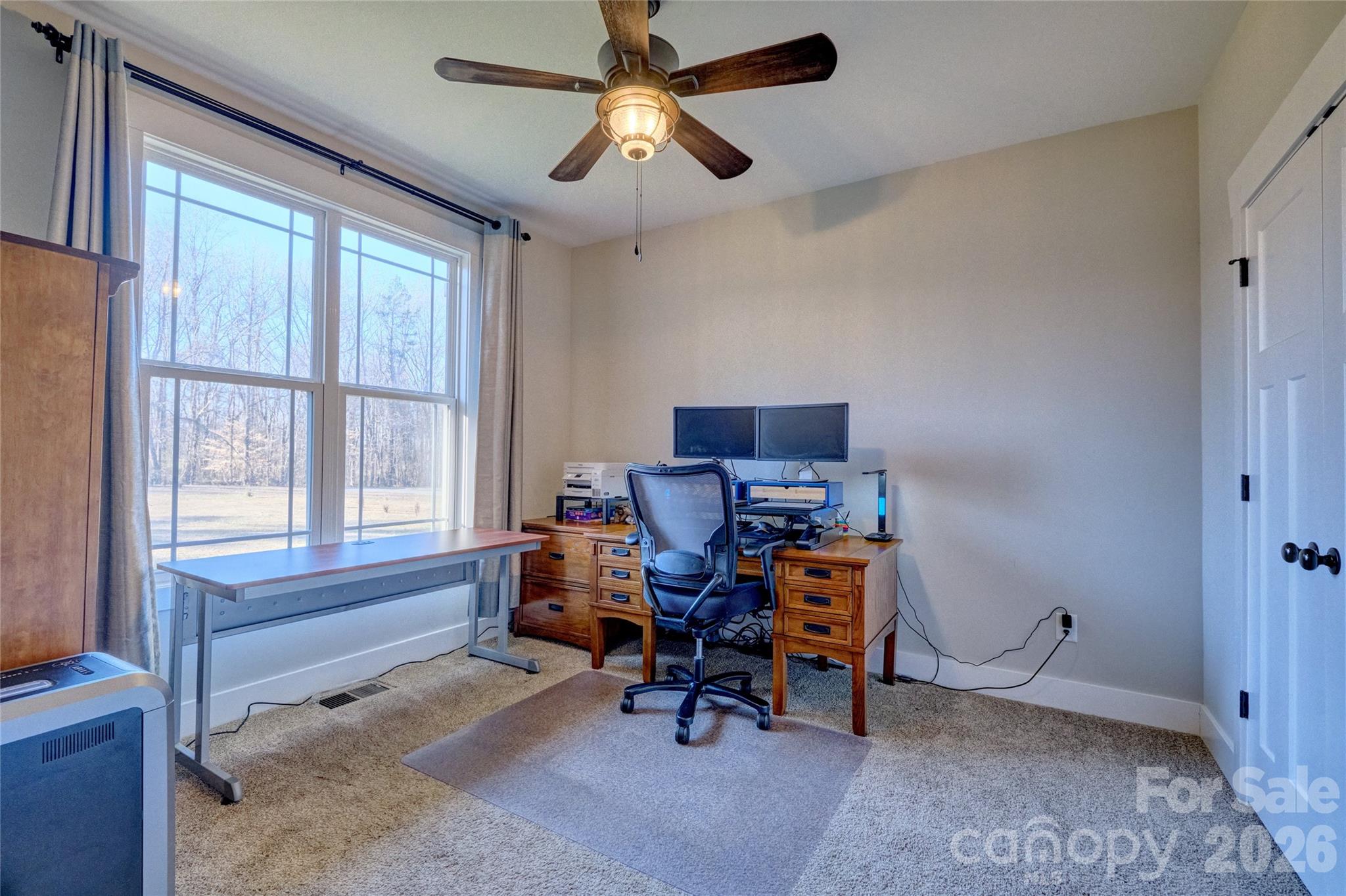 398 Kingsburry Road Clover, SC 29710 - Photo 25 of 48 a view of a workspace with furniture and a window