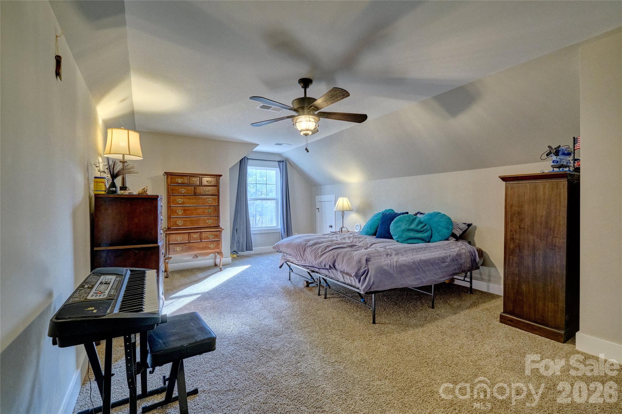 398 Kingsburry Road Clover, SC 29710 - Photo 30 of 48 a living room with furniture and a chandelier