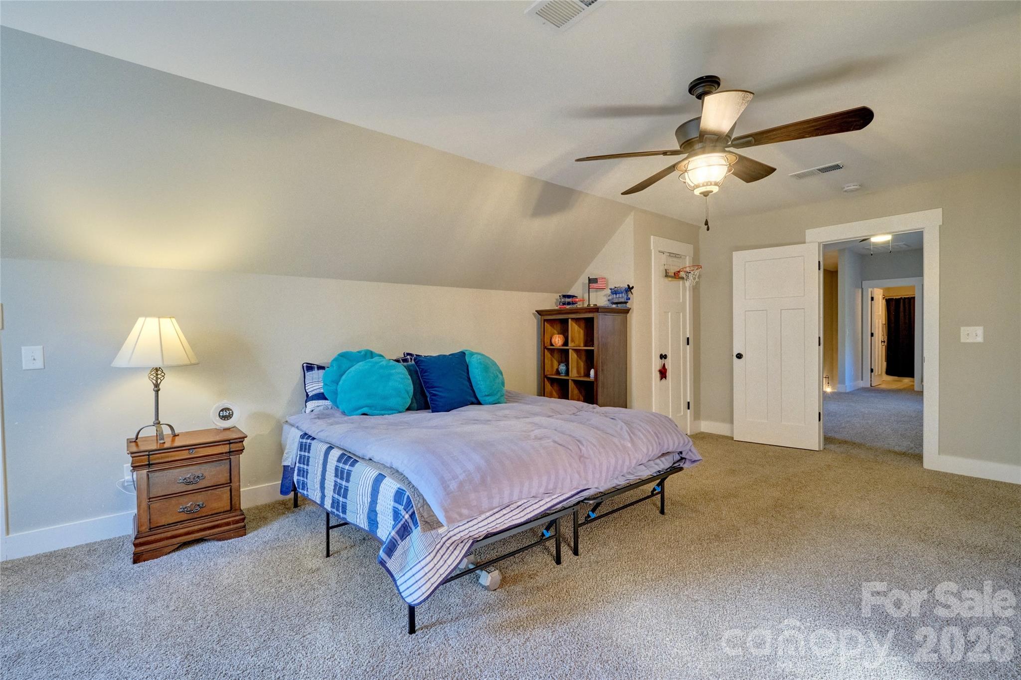 398 Kingsburry Road Clover, SC 29710 - Photo 31 of 48 a bedroom with a bed and a chandelier