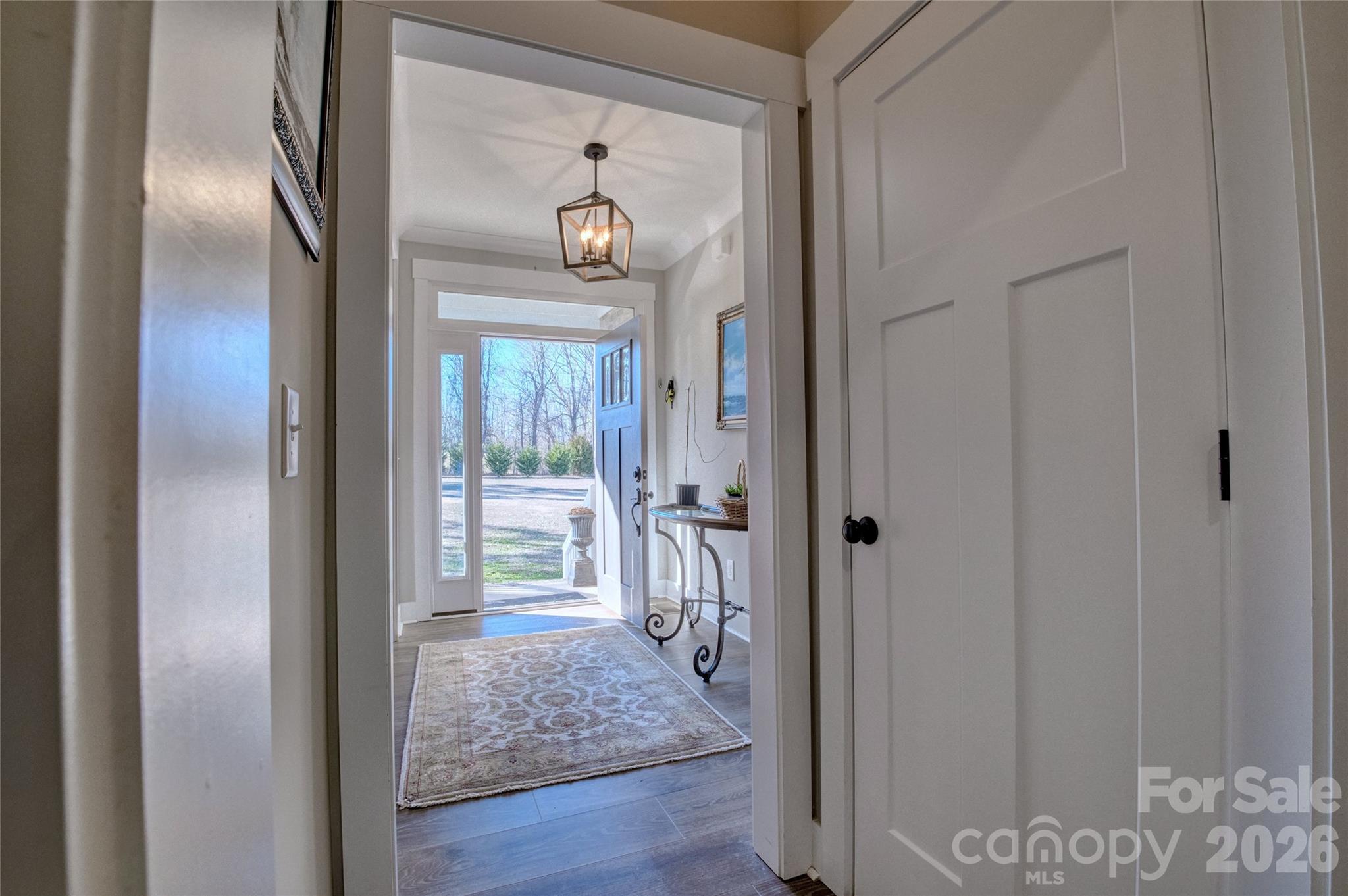 398 Kingsburry Road Clover, SC 29710 - Photo 4 of 48 a view of hallway with wooden floor and front door