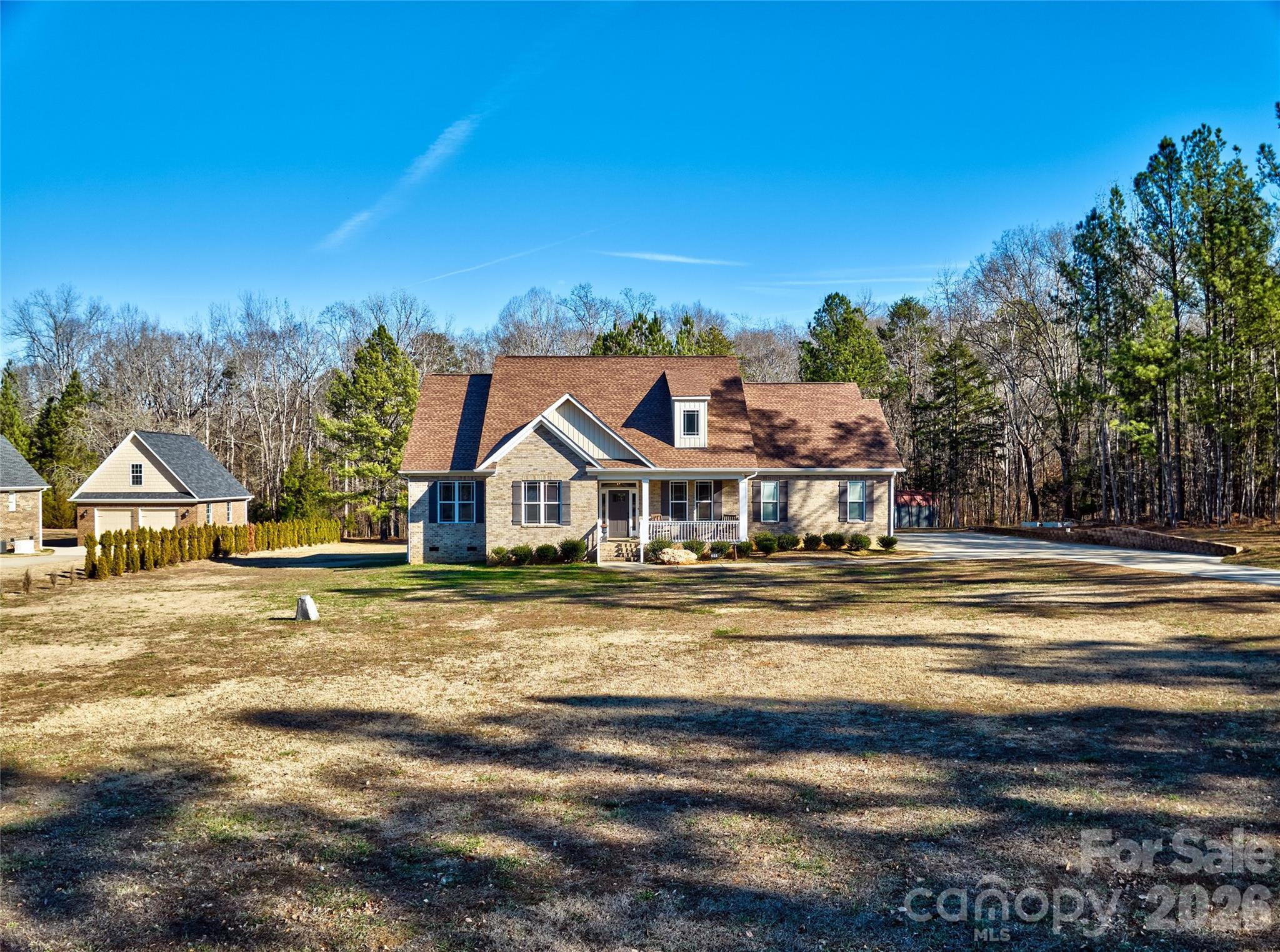 398 Kingsburry Road Clover, SC 29710 - Photo 45 of 48 a view of a large house with a big yard and large trees