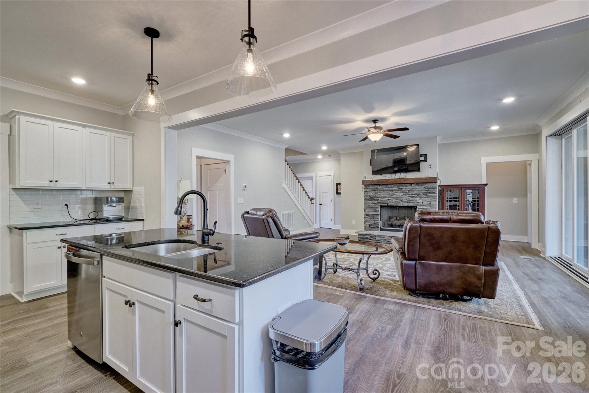 398 Kingsburry Road Clover, SC 29710 - Photo 10 of 48 a kitchen with kitchen island granite countertop a sink cabinets and stainless steel appliances