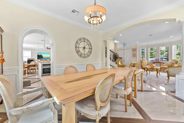 a view of a dining room with furniture window and outside view