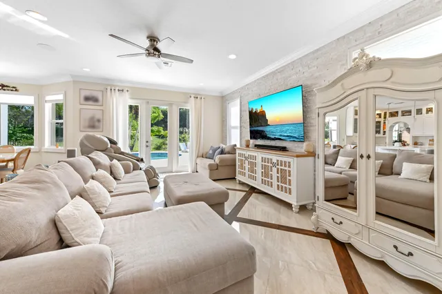 a bedroom that has a bed and a bookshelf in it