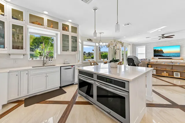 a spacious bedroom with a large bed and a couch