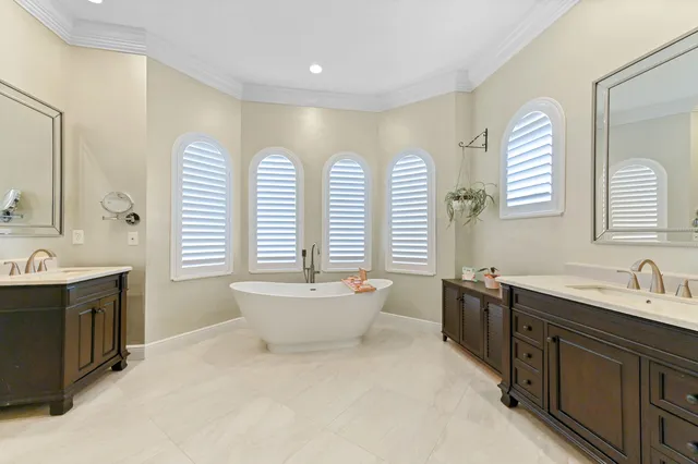 a view of a house with a yard and a garden