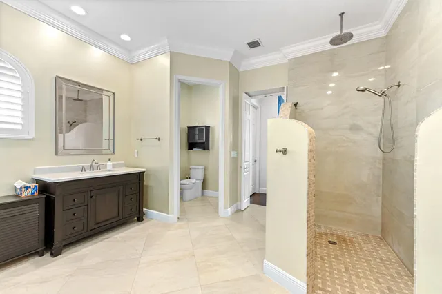 a kitchen with a sink and a refrigerator