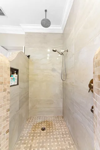 a view of a garage with a bike and a car parked