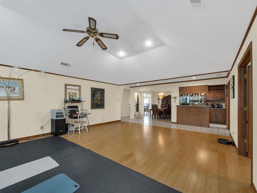 10211 Shadow Way Dallas, TX 75243 - Photo 11 of 39 a view of a livingroom with furniture hardwood floor and windows