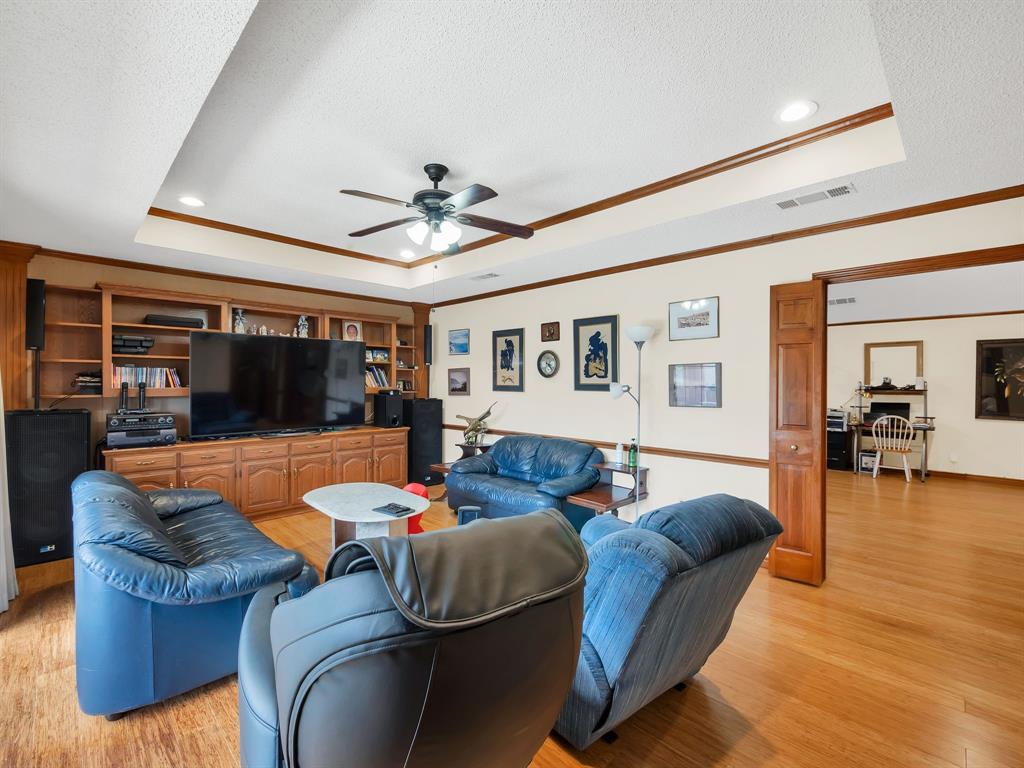 10211 Shadow Way Dallas, TX 75243 - Photo 18 of 39 a living room with furniture and a large window
