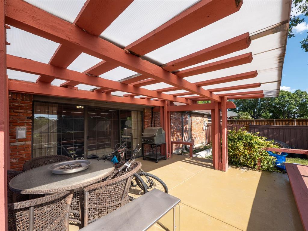 10211 Shadow Way Dallas, TX 75243 - Photo 38 of 39 a view of a backyard with sitting area and furniture