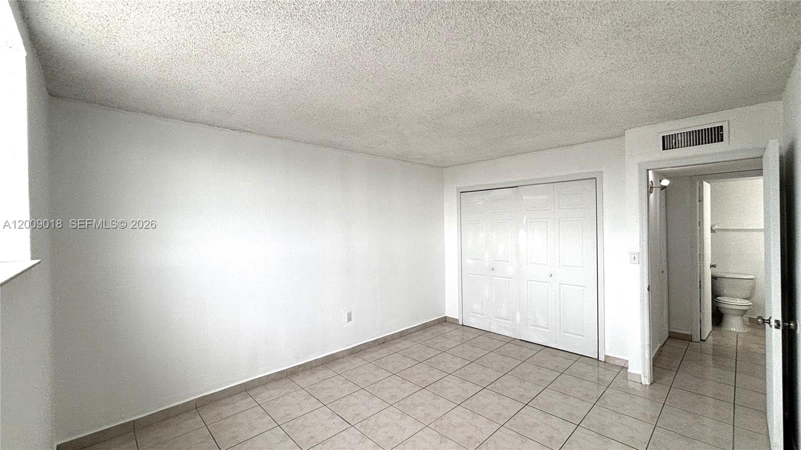 666 West 81st Street, Unit 304 Hialeah, FL 33014 - Photo 15 of 21 a view of an empty room