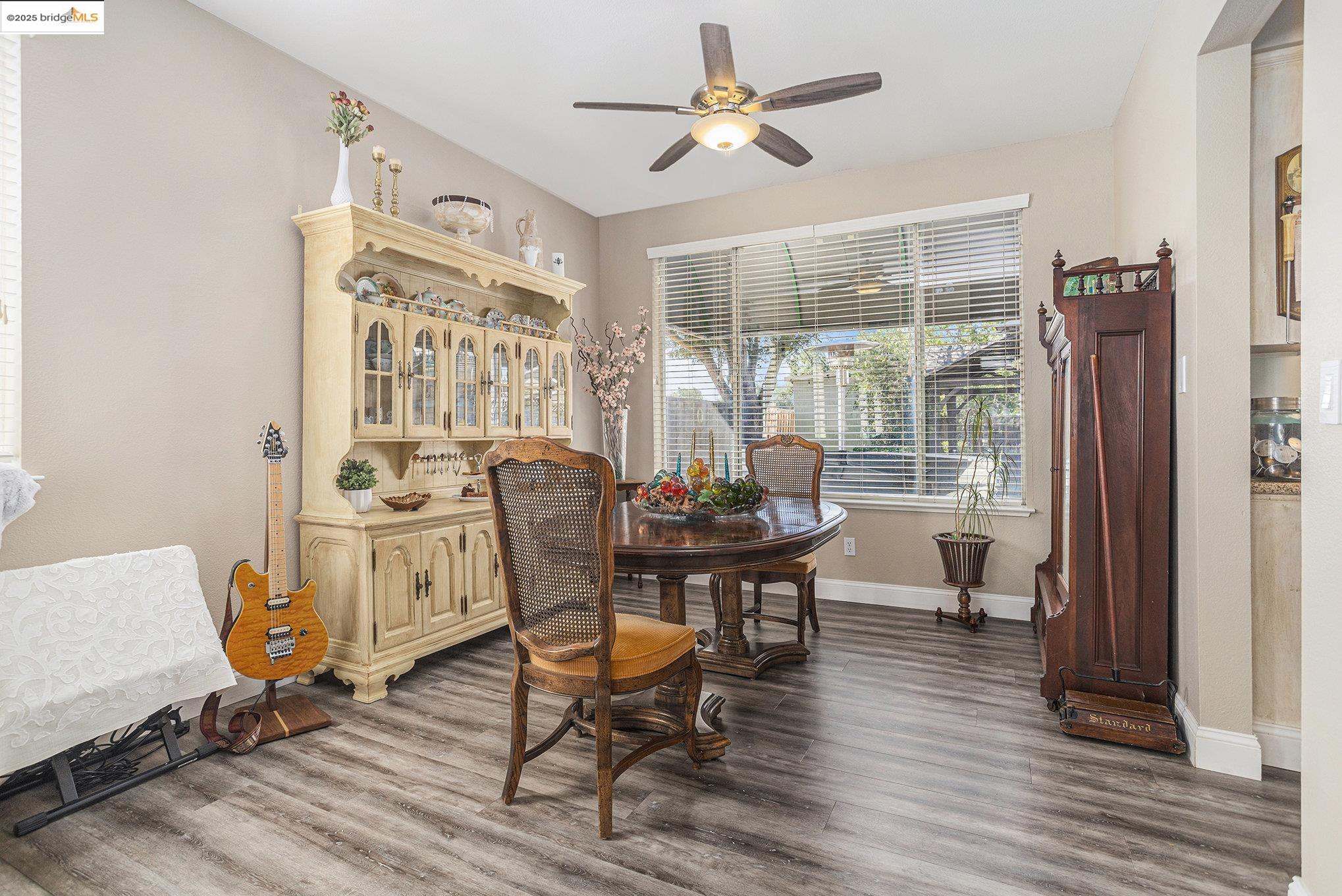 2059 Heartland Court Brentwood, CA 94513 - Photo 11 of 37 a view of a dining room with furniture window and wooden floor