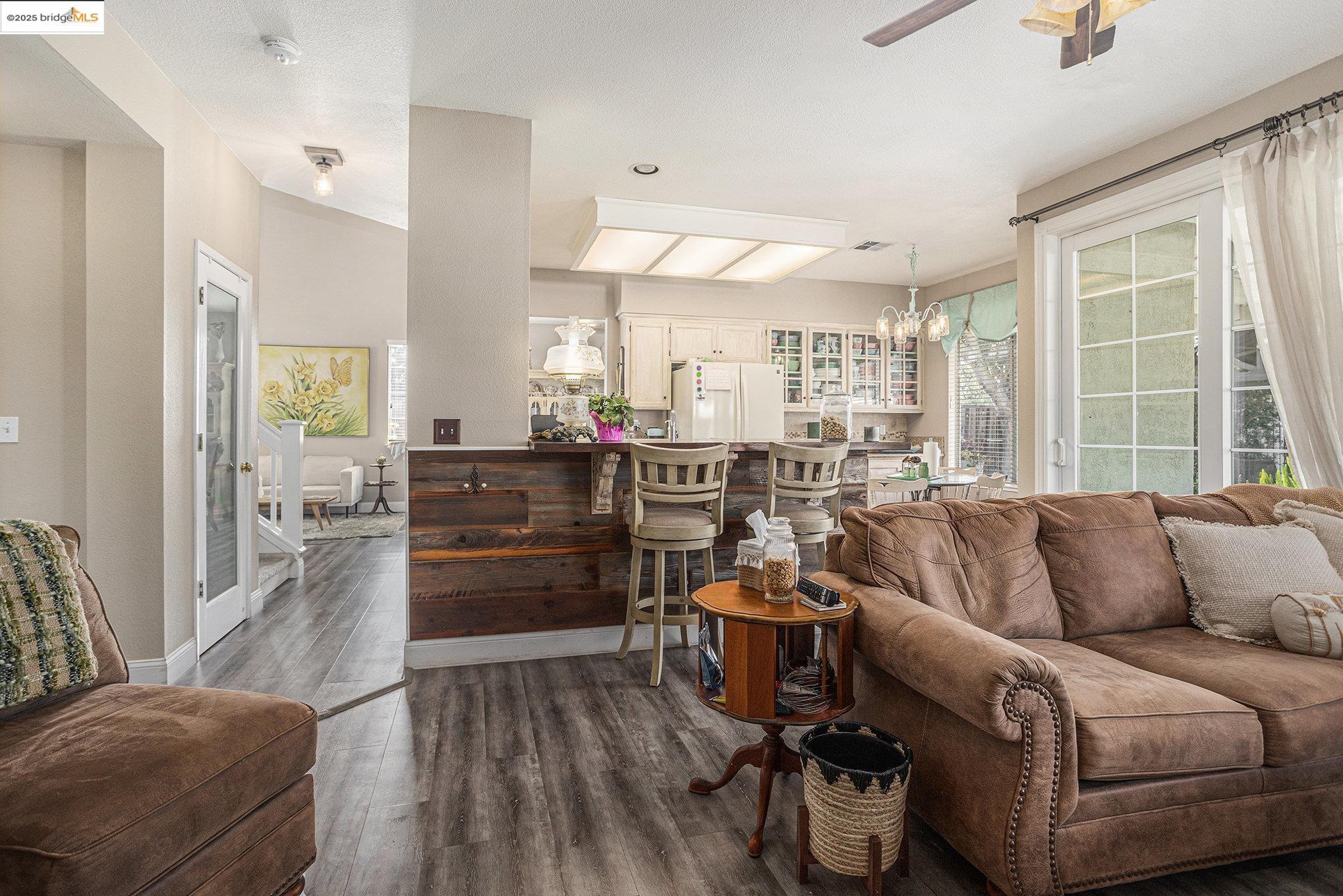 2059 Heartland Court Brentwood, CA 94513 - Photo 13 of 37 a living room with furniture and a large window