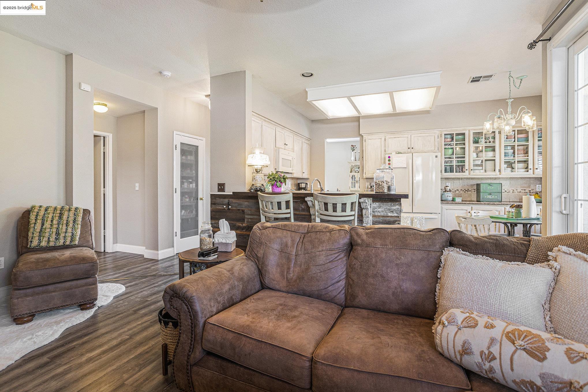 2059 Heartland Court Brentwood, CA 94513 - Photo 14 of 37 a living room with furniture and a large window