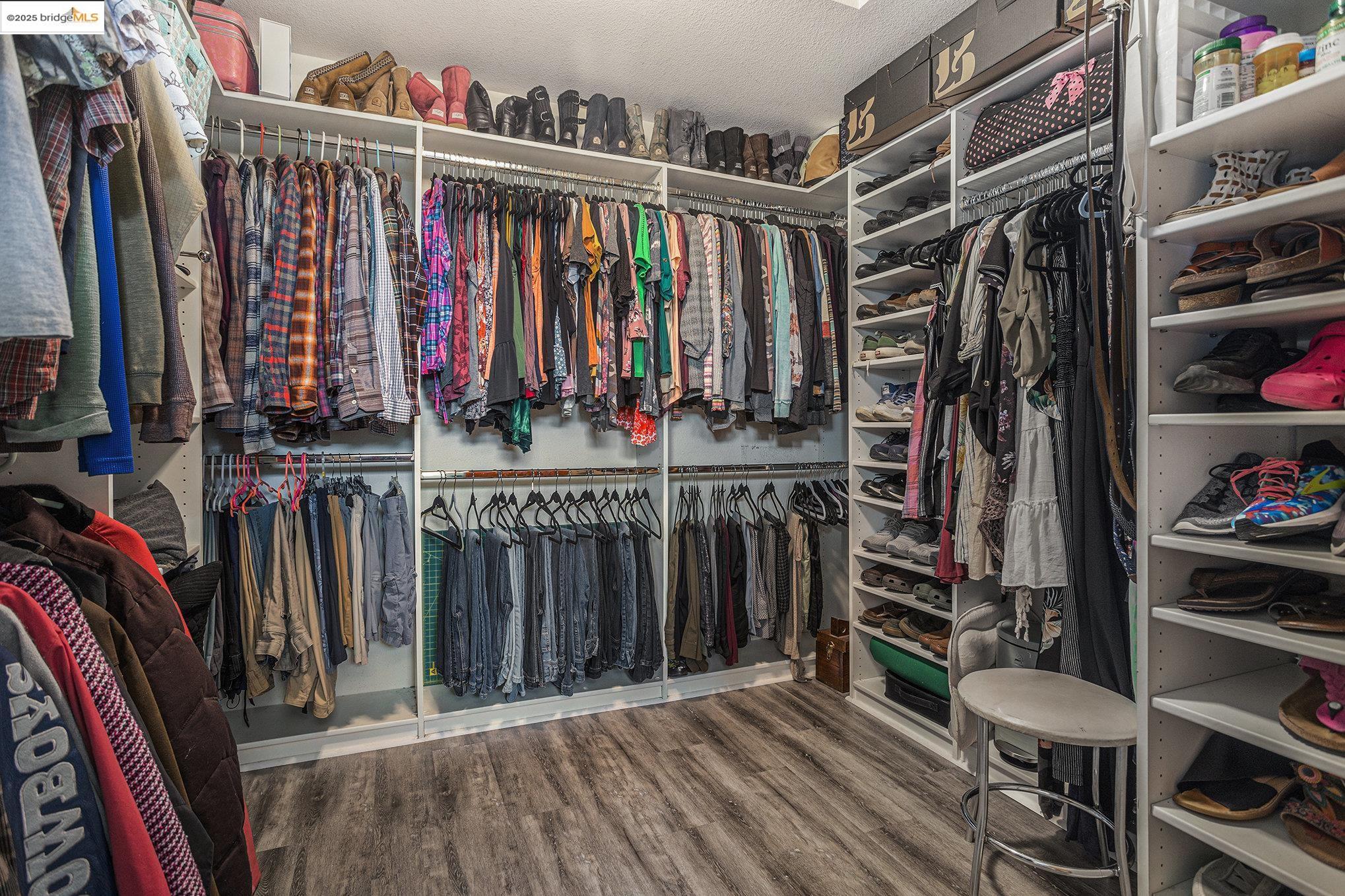 2059 Heartland Court Brentwood, CA 94513 - Photo 22 of 37 a view of walk in closet with clothes and shoes