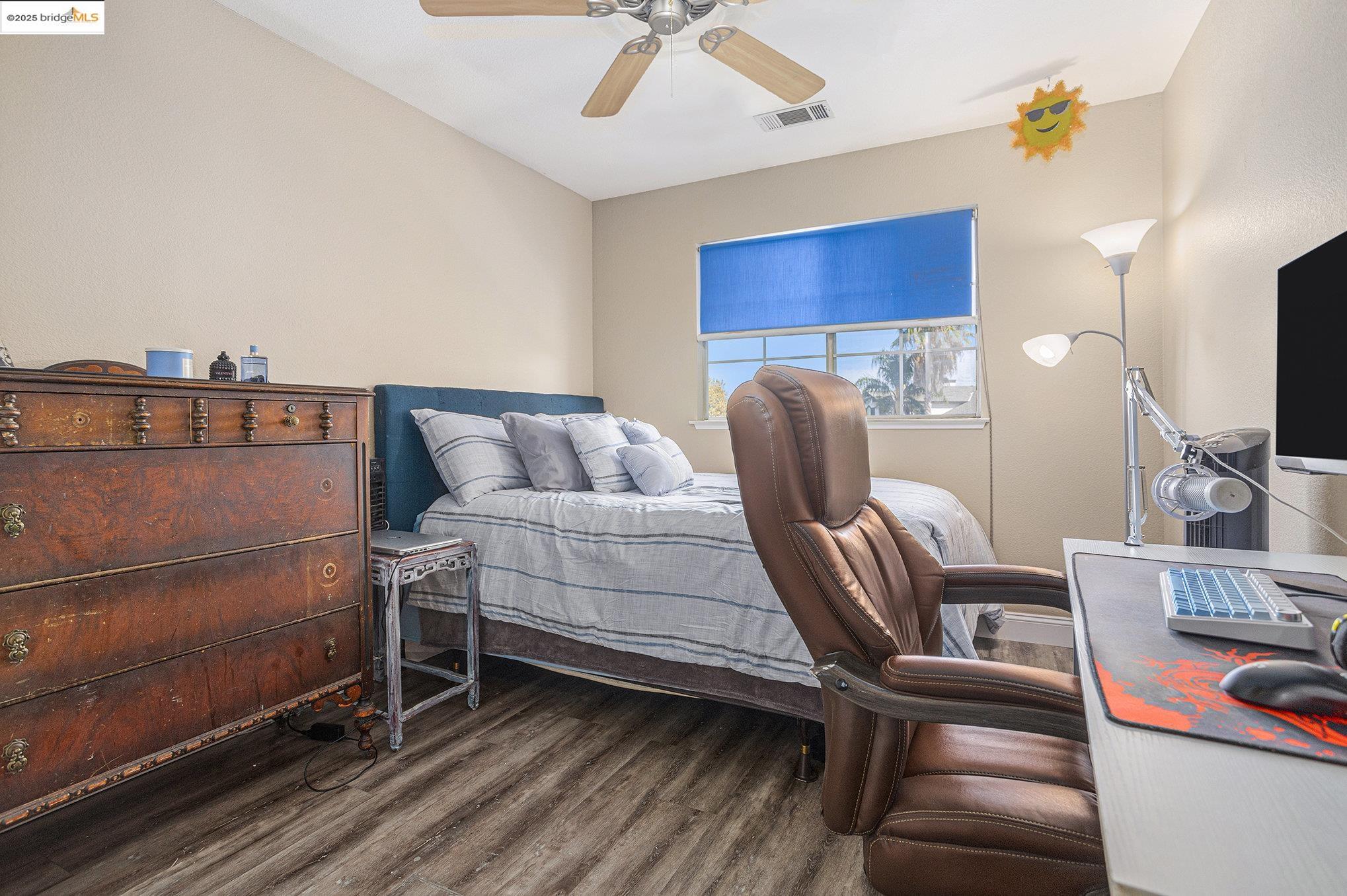 2059 Heartland Court Brentwood, CA 94513 - Photo 23 of 37 a bedroom with furniture and a flat screen tv