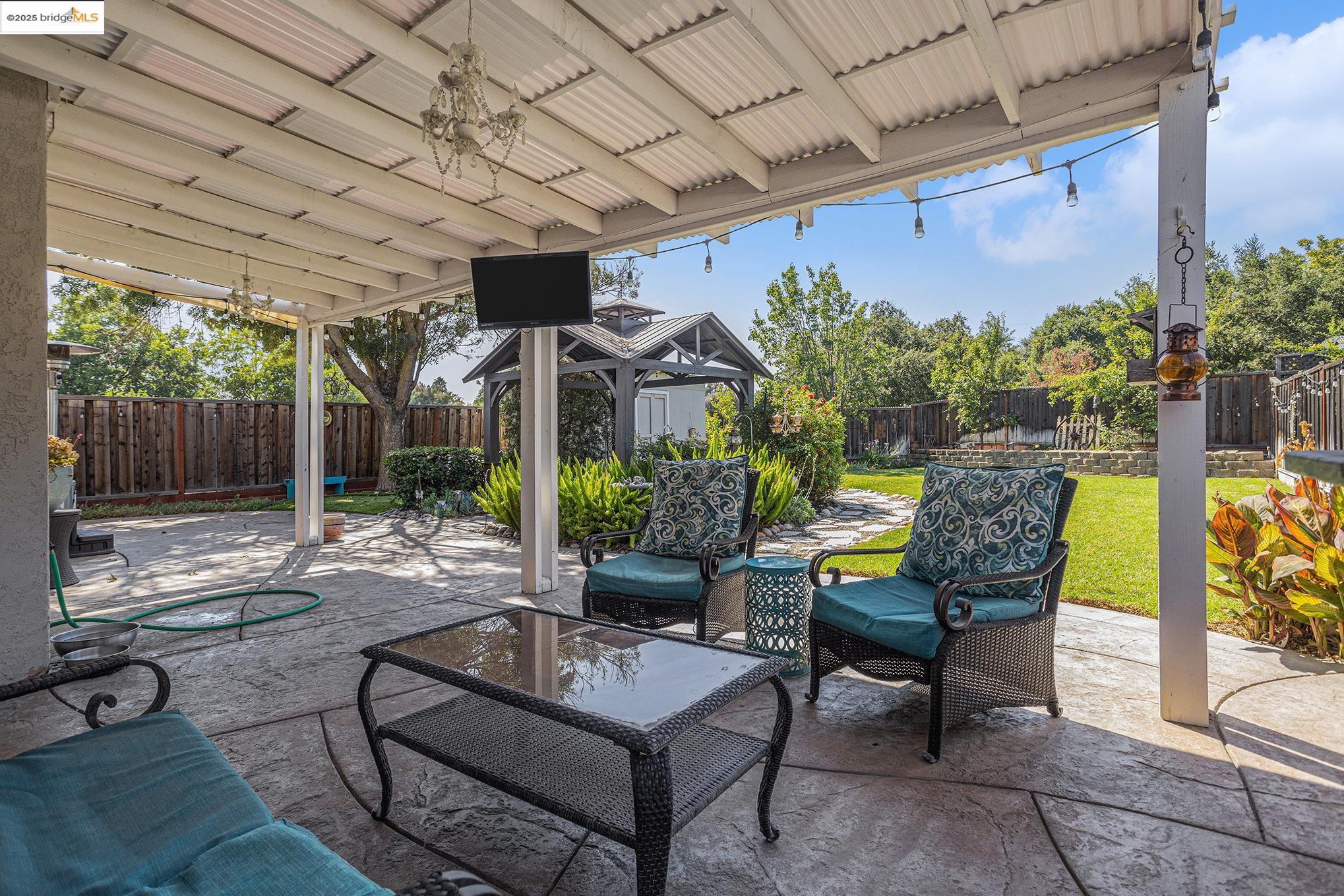 2059 Heartland Court Brentwood, CA 94513 - Photo 28 of 37 a view of a patio with couches table and chairs and potted plants