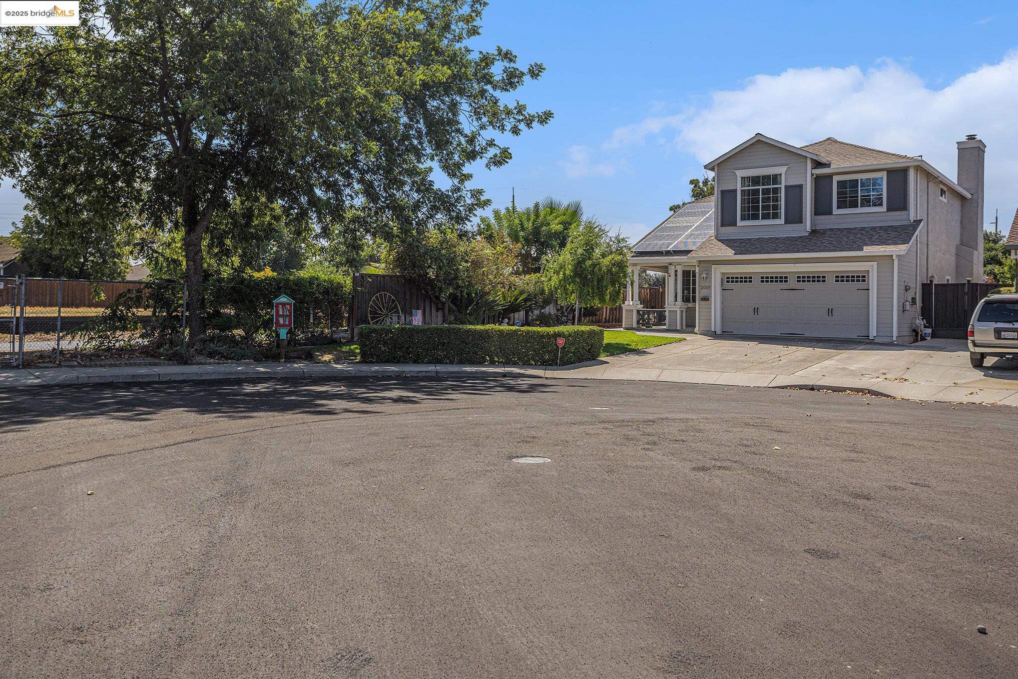 2059 Heartland Court Brentwood, CA 94513 - Photo 3 of 37 a view of a house with a street
