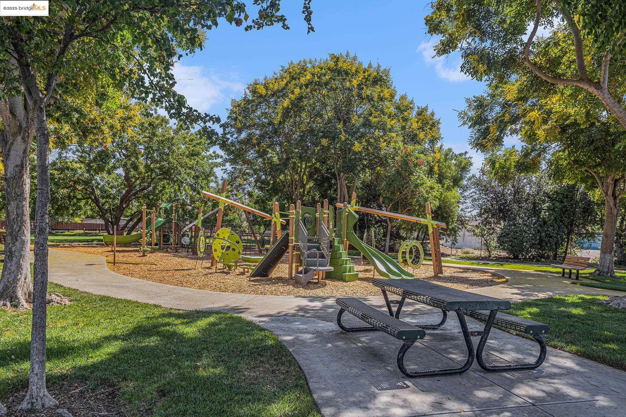 2059 Heartland Court Brentwood, CA 94513 - Photo 35 of 37 a view of a park with slide