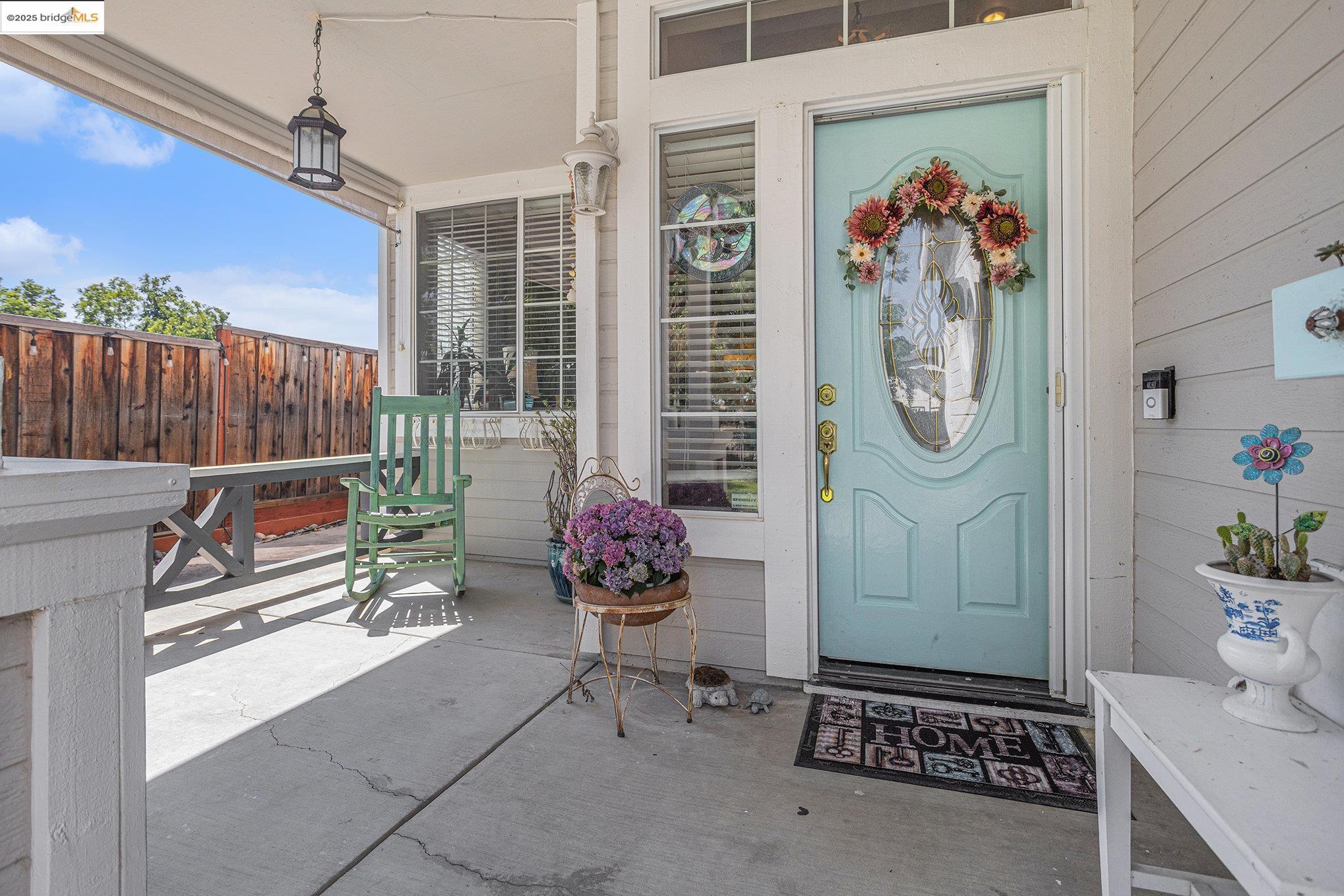 2059 Heartland Court Brentwood, CA 94513 - Photo 6 of 37 a room with furniture a rug and a window