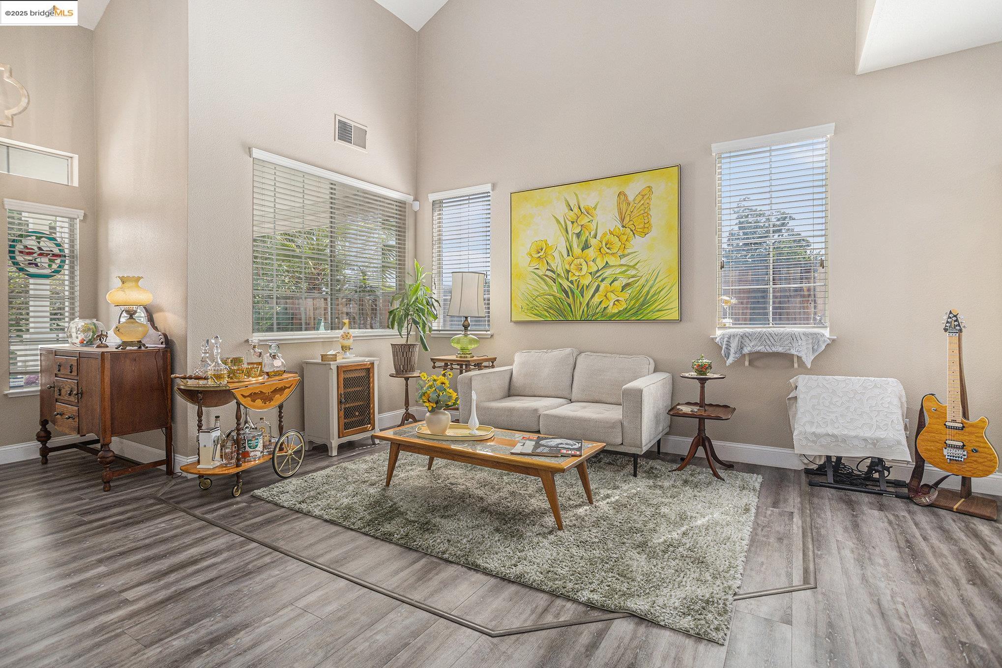 2059 Heartland Court Brentwood, CA 94513 - Photo 9 of 37 a living room with furniture and a wooden floor
