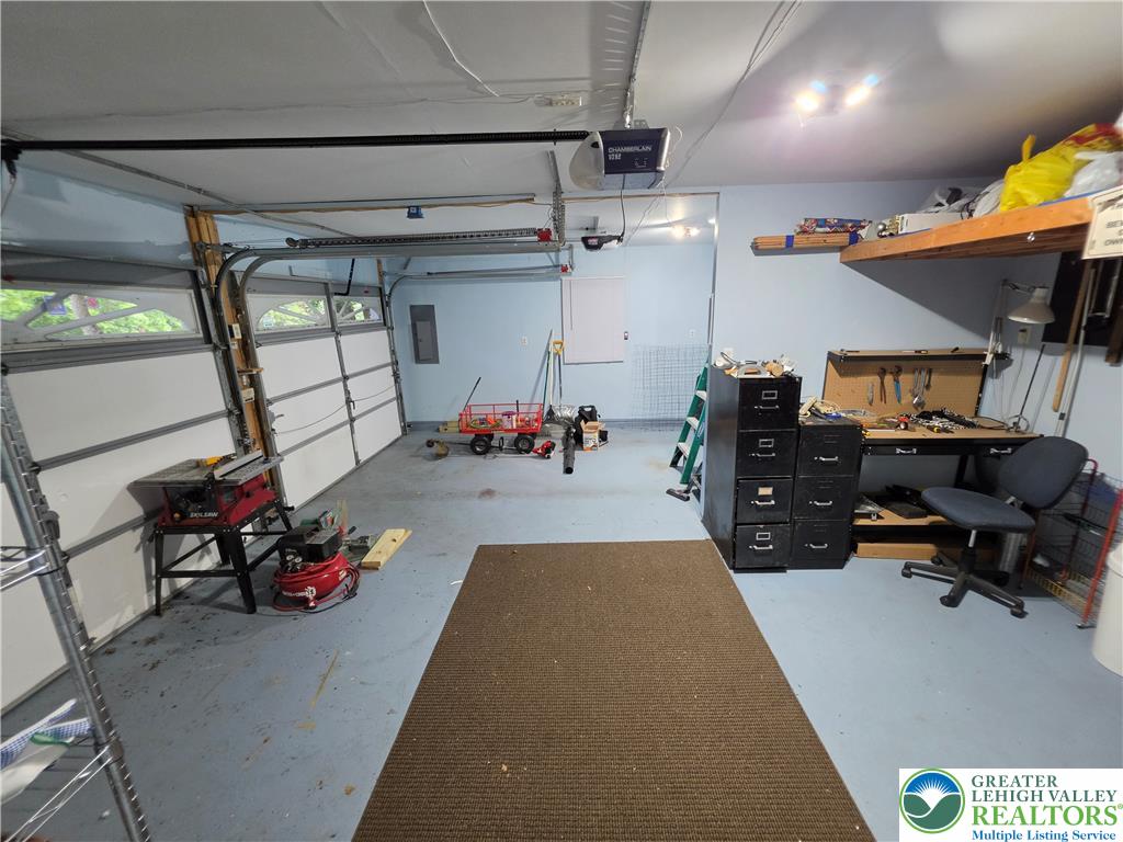 211 Murphy Circle Bushkill, PA 18324 - Photo 27 of 28 Secure parking and ample storage in this well-appointed attached garage.