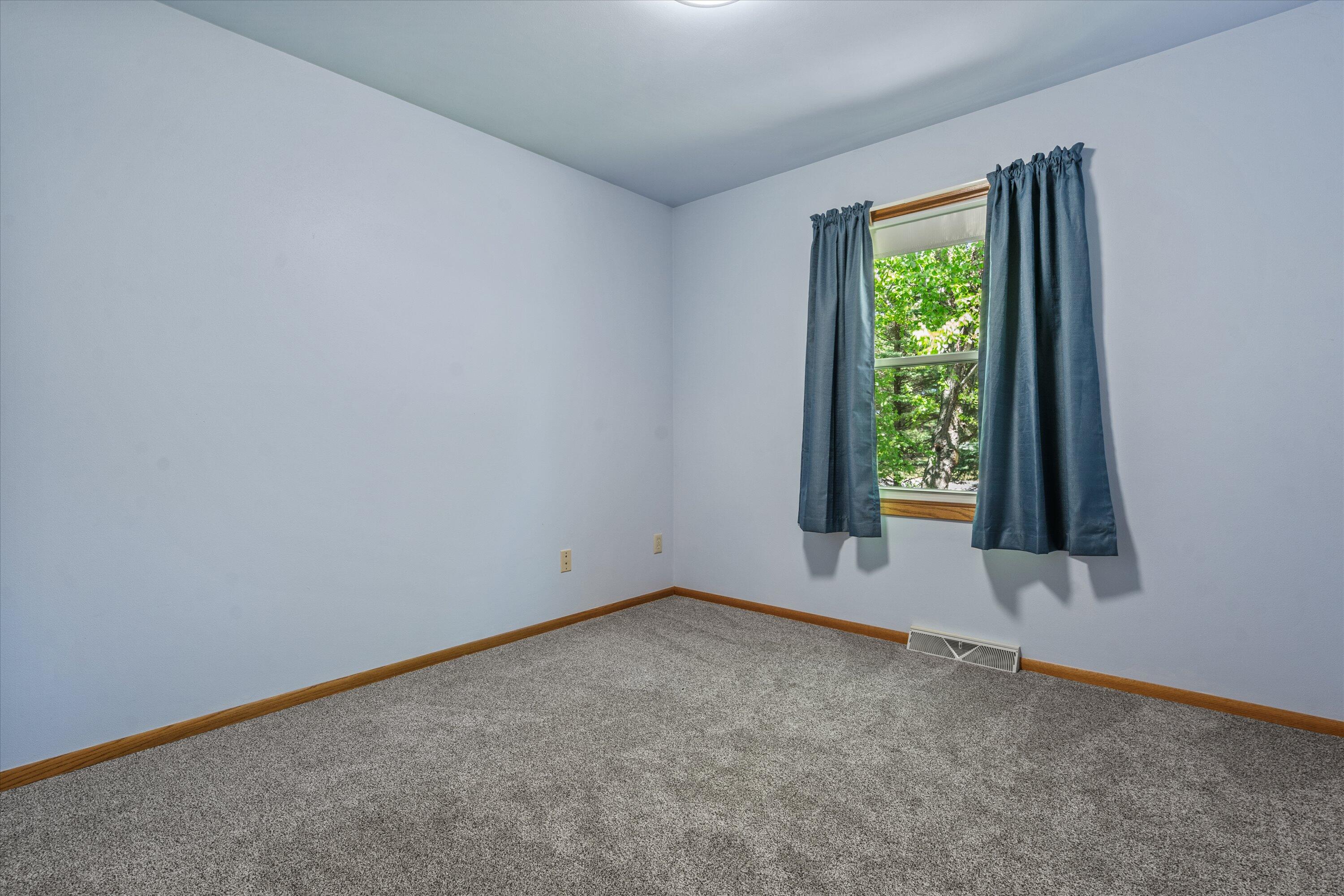 620 Prairie View Drive North Prairie, WI 53153 - Photo 42 of 52 3rd Bedroom With Brand New Carpeting