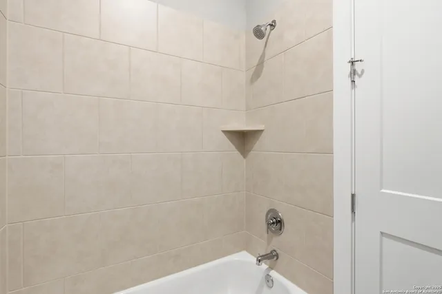 a bathroom with a bathtub