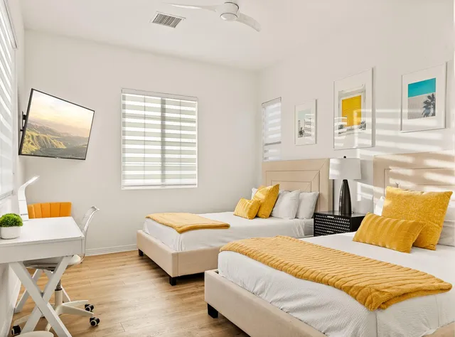 a bathroom with a toilet sink and a mirror