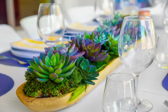 a view of house with swimming pool and outdoor seating