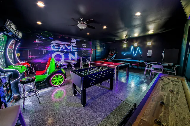 a view of a house with a yard and potted plants