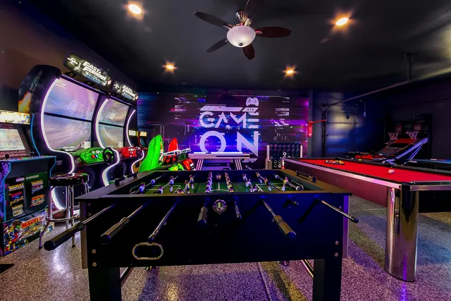 a utility room with cabinets washer and dryer