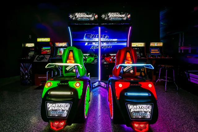 a kitchen with stainless steel appliances kitchen island granite countertop a stove and a sink