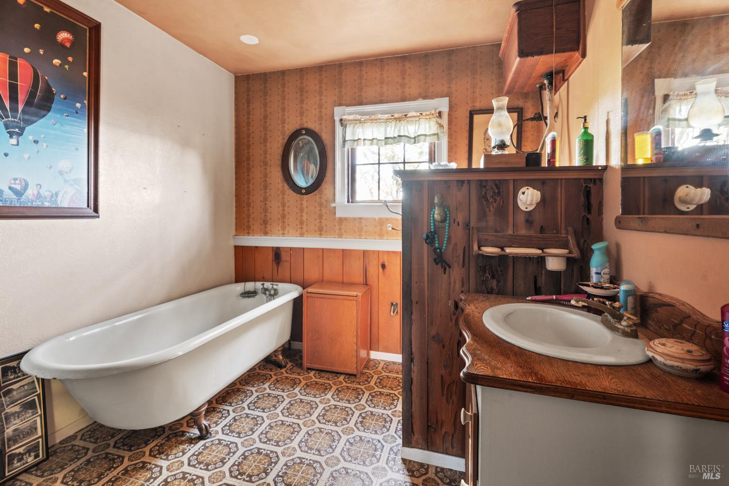 24600 String Creek Road Willits, CA 95490 - Photo 17 of 24 a bathroom with a sink and a mirror