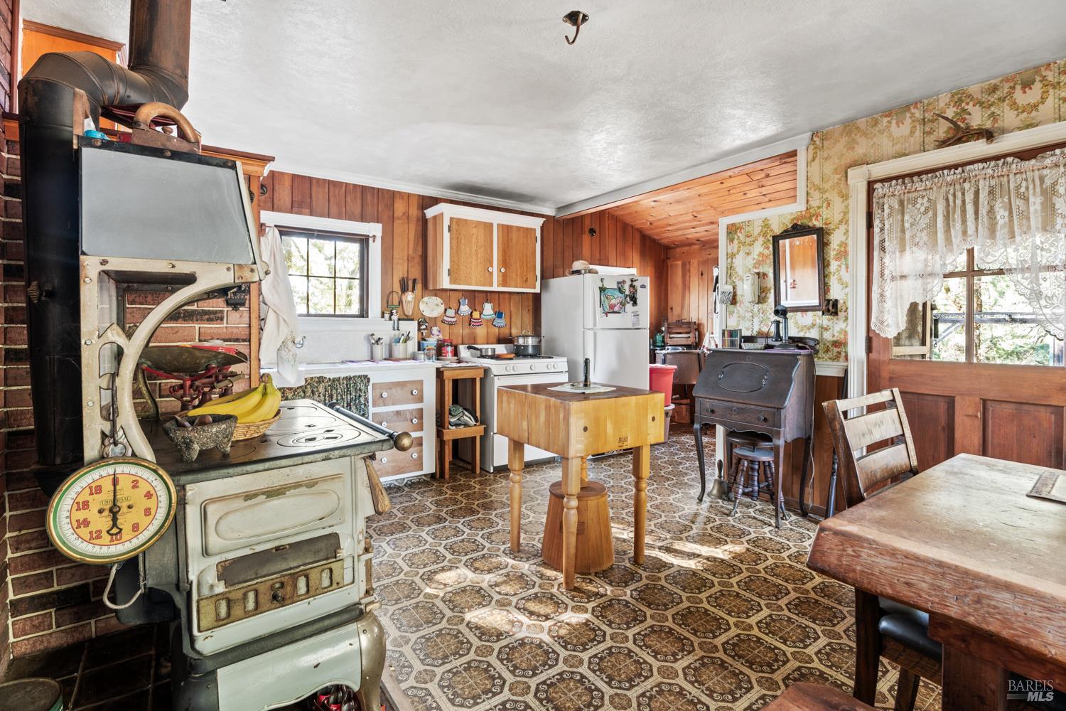 24600 String Creek Road Willits, CA 95490 - Photo 20 of 24 a view of a dining room with furniture window and outside view
