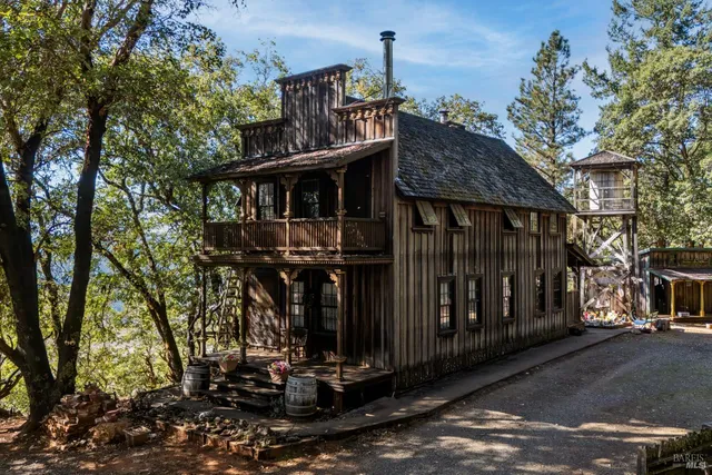 a view of a house with brick walls