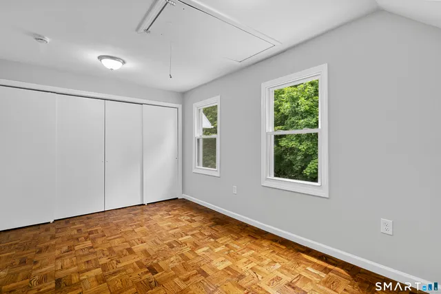 a house with trees in front of it