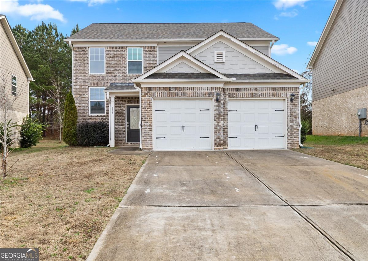116 Al Jennah Boulevard Locust Grove, GA 30248 - Photo 1 of 1 a front view of a house with a yard