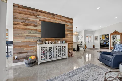 a kitchen with lots of counter top space appliances and a center island