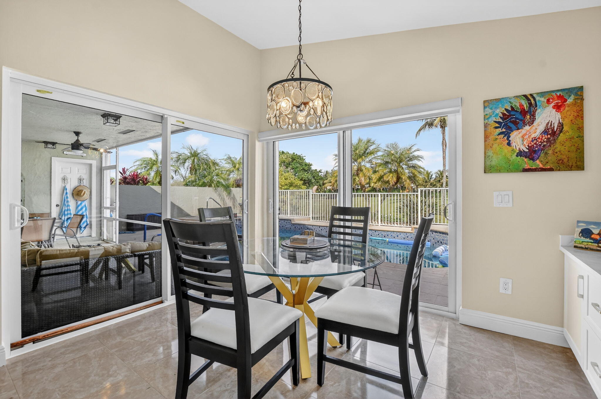 11270 Cloverleaf Circle Boca Raton, FL 33428 - Photo 13 of 98 a view of a dining room with furniture window and outside view