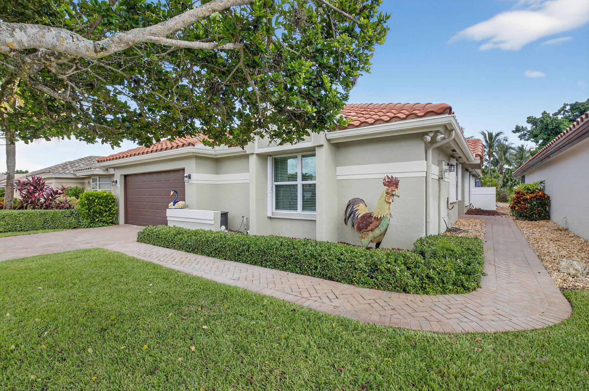 11270 Cloverleaf Circle Boca Raton, FL 33428 - Photo 3 of 98 a front view of a house with a yard