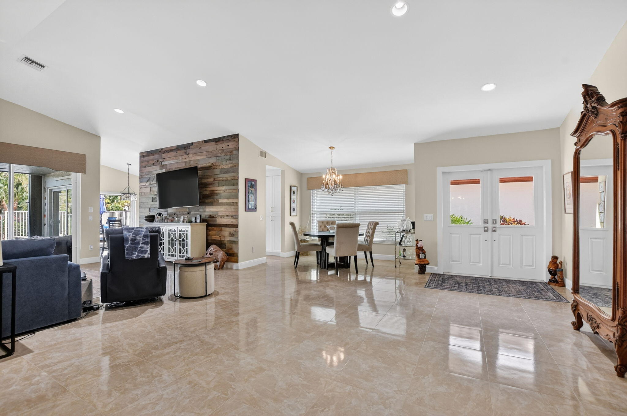 11270 Cloverleaf Circle Boca Raton, FL 33428 - Photo 6 of 98 a living room with furniture and a flat screen tv